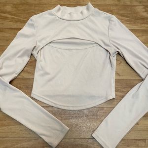 cream mockneck crop top with cutout